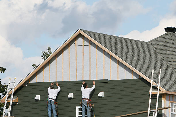 Professional Emergency Siding Repair technician working in Holloway, OH